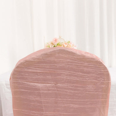 Pink chair cover with a textured finish, styled for events.