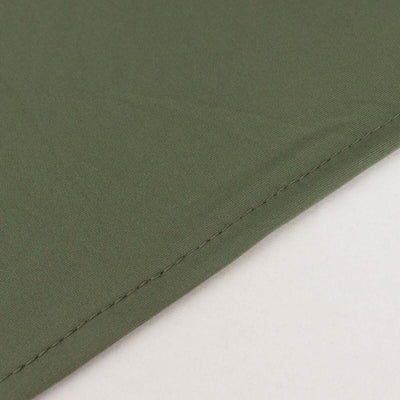 Close-up of olive green fabric showing stitching detail.