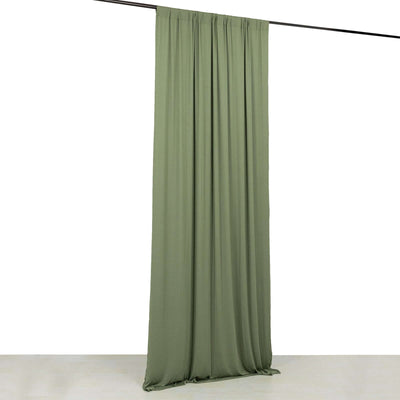 Olive green curtain draped on a rod against a white background