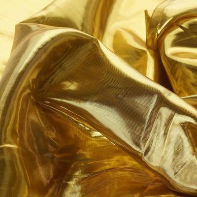 Shiny gold fabric with a smooth texture and reflective surface.