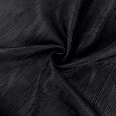 Black textured fabric with a subtle sheen and elegant drape.