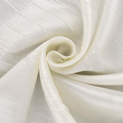 Cream textured fabric close-up showcasing elegant drape and sheen.