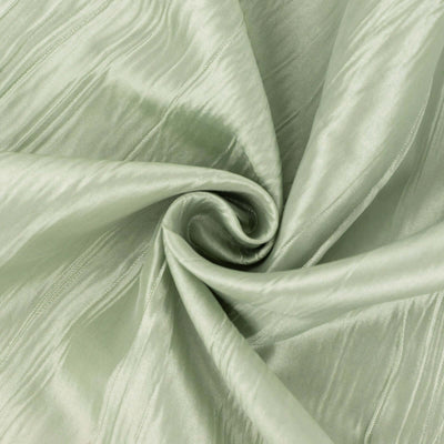 Light green satin fabric with a smooth, shiny texture.