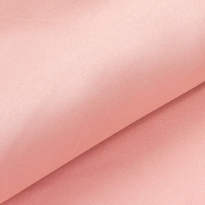 Soft pink satin fabric, beautifully draped and textured.
