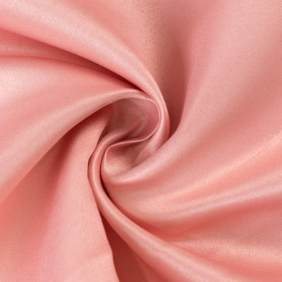 Soft pink satin fabric with a smooth, luxurious texture.