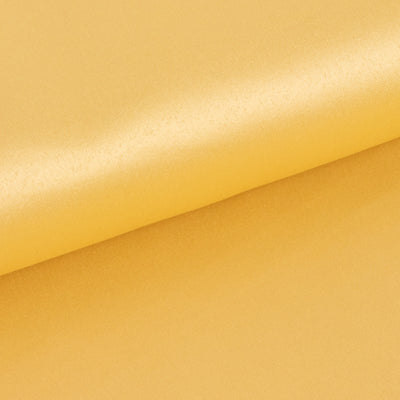 Yellow satin fabric folded, showcasing its smooth texture.
