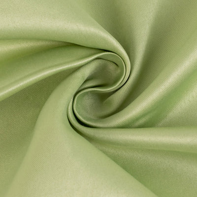 Soft green satin fabric, elegantly twisted to showcase its smooth texture.