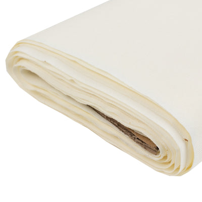 Rolled cream canvas fabric for sewing projects.
