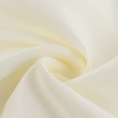 Soft cream fabric texture in gentle folds.