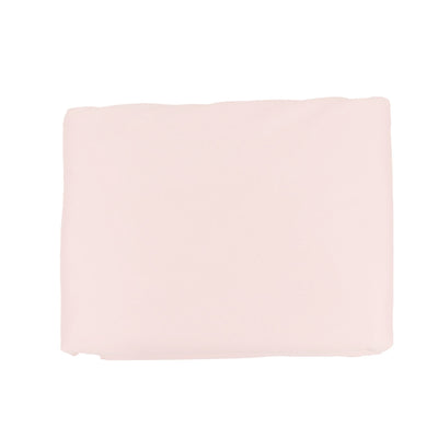 Light pink fabric swatch on white background