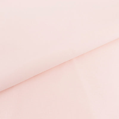 Soft pink fabric texture on a smooth surface.