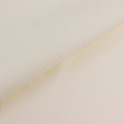Cream textured fabric in a folded display.
