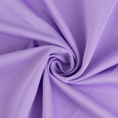 Purple textured fabric swirl close-up showing soft, smooth material details.