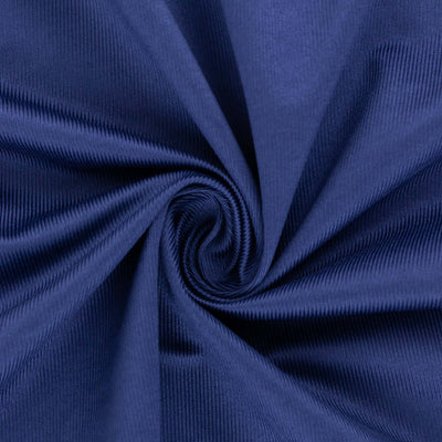 Navy blue textured fabric swirl pattern close-up shot.