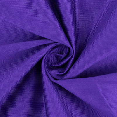 Purple textured fabric in a spiral pattern.