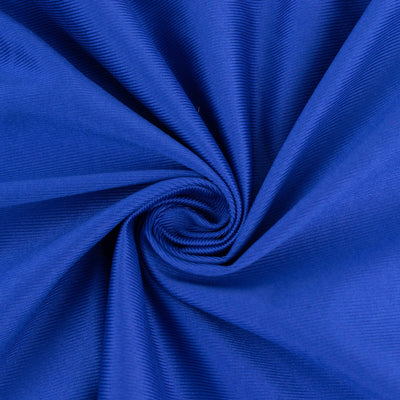 Blue fabric with a smooth texture, elegantly swirling in a spiral pattern.