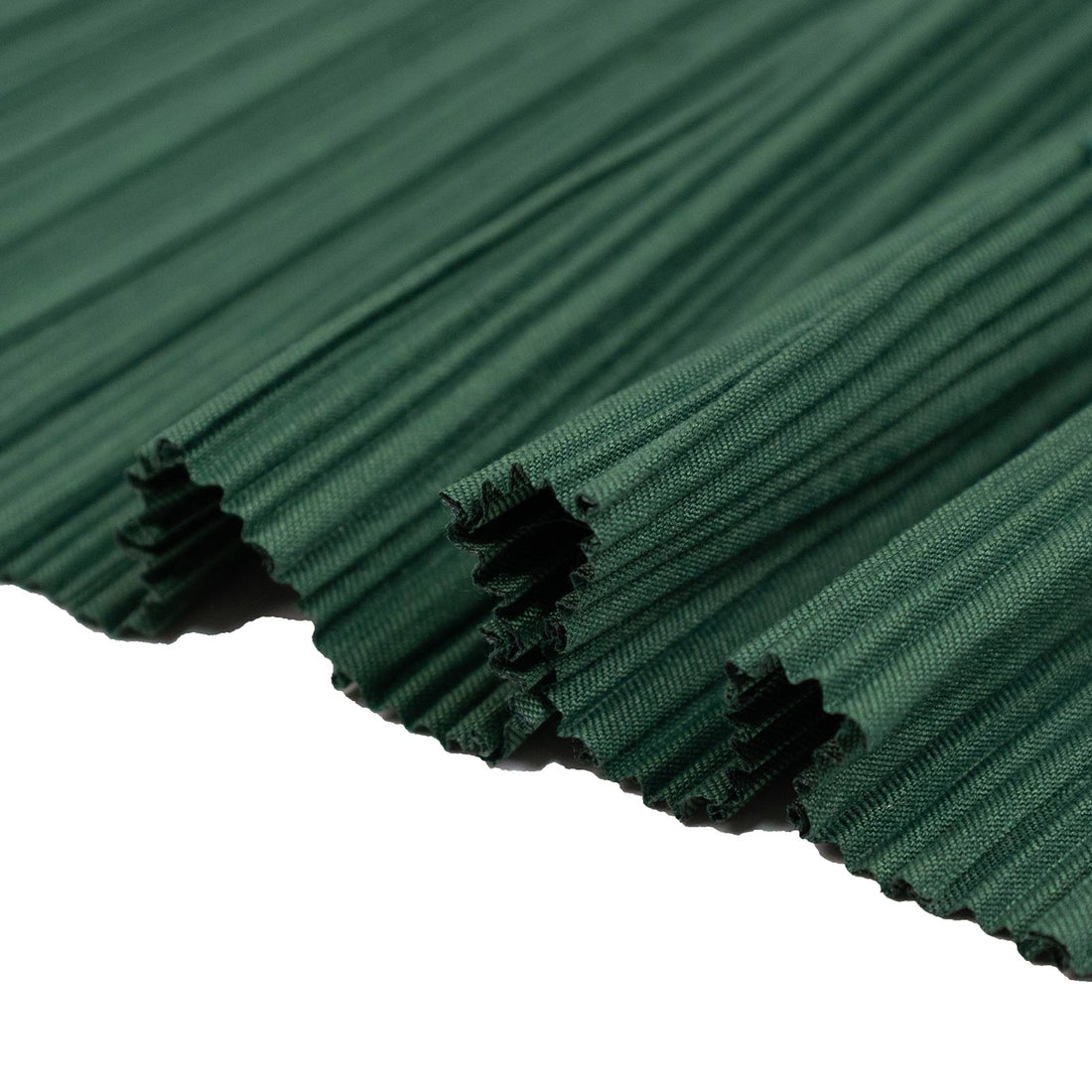 Dark green ribbed fabric swatch with textured frayed edges