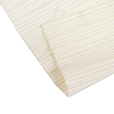 White textured folded fabric close-up on a clean background