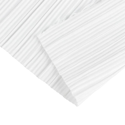 White pleated air filter replacement panel on a plain background
