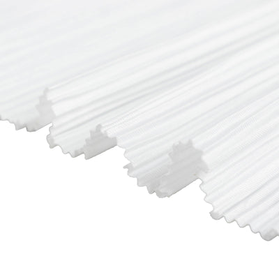 White sheer pleated fabric with soft light rays