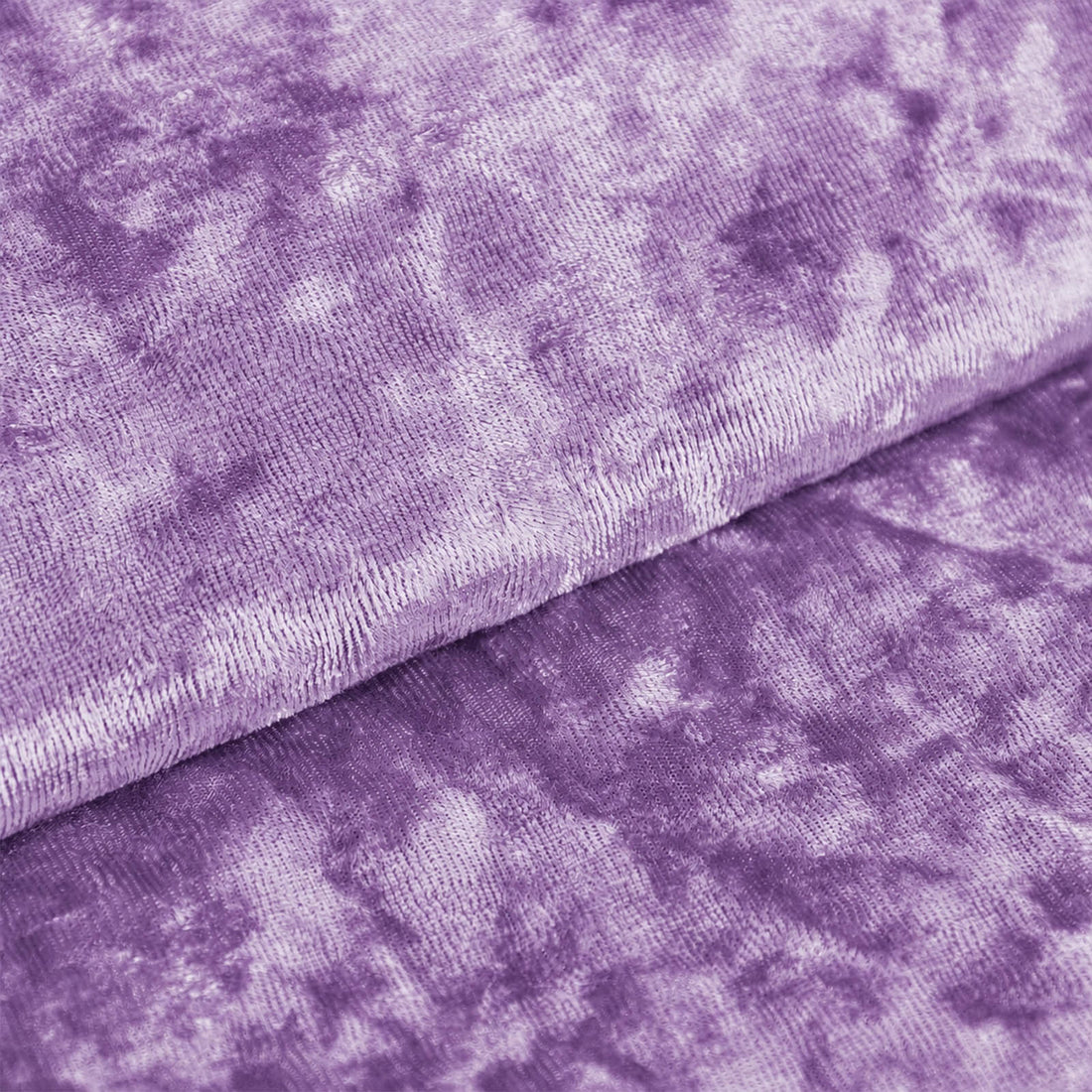 Purple tie-dye velvet fabric texture close-up
