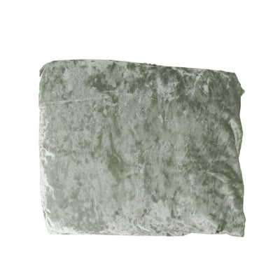 Soft green velvet blanket, plush and cozy for comfort.