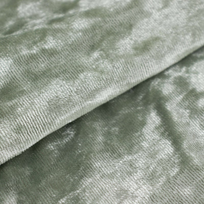 Soft green velvet fabric with textured finish.
