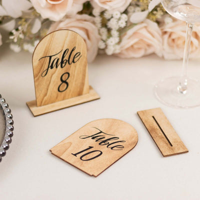 Wooden table numbers 8 and 10 with stand for wedding or event decor.