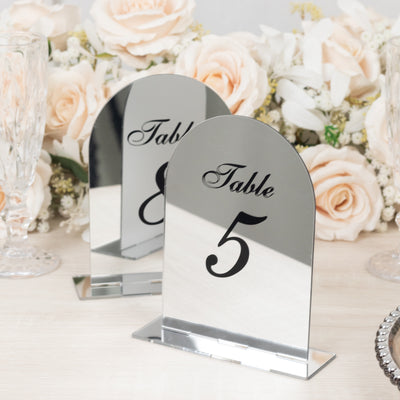 Mirrored table numbers 5 and 8 for elegant event décor.