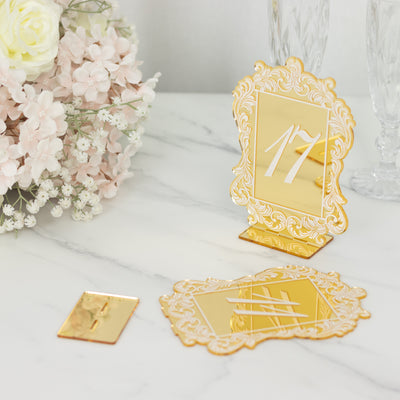 Gold table number holder with ornate design, number 17 displayed.