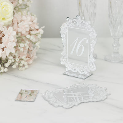 Elegant table number 16 sign with decorative frame and base, perfect for events.