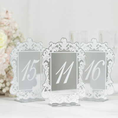 Elegant table number holders with ornate design, numbers 11, 15, and 16.