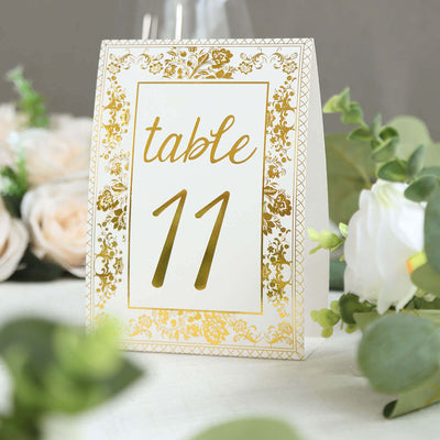 Elegant table number card with gold accents, marked "Table 11"