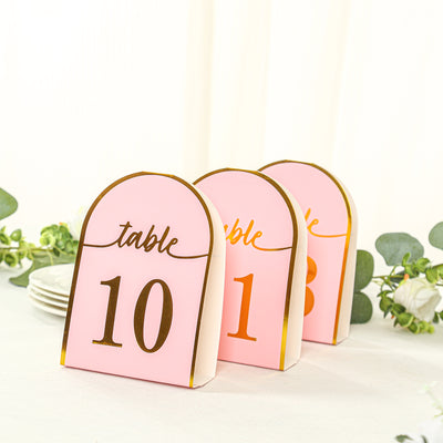 Table number cards in pink and gold for events