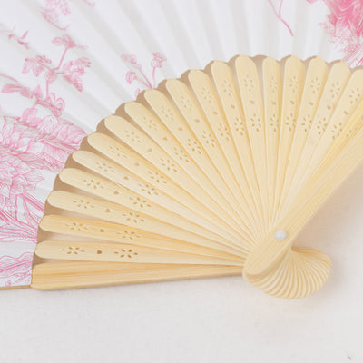 Decorative hand fan with intricate design and wooden frame