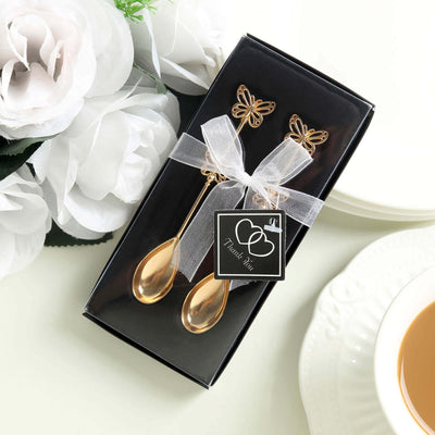 Gold butterfly spoons gift set in black box with ribbon.