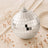 Silver mosaic disco ball ornament with reflective tiles and rose gold decor