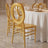 Gold chiavari chairs at elegant wedding reception table with white linens