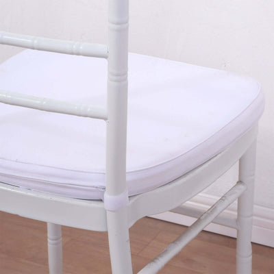 White padded chair cushion with a sleek design and soft fabric.