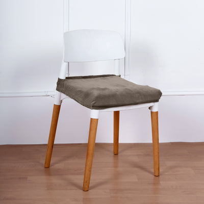 White chair with a gray cushion on a wooden floor.