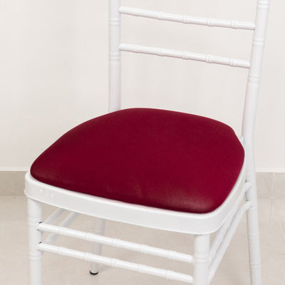White chiavari chair with burgundy cushion
