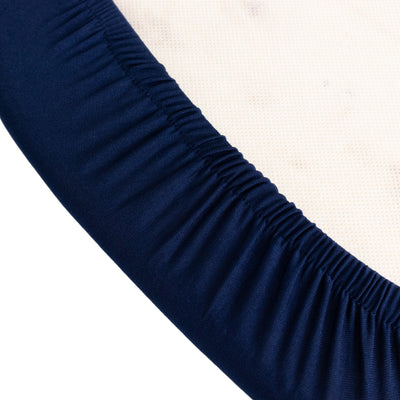 Navy stretch fitted sheet with gathered edges for a snug fit.