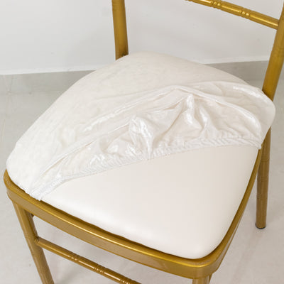 White chair cushion cover on a gold chair