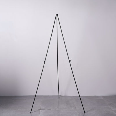 Black metal tripod stand for photography or display purposes
