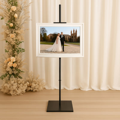 Elegant photo display stand featuring a framed picture of a couple in formal attire.