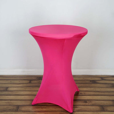Pink stretch table cover for round table, perfect for events and parties.