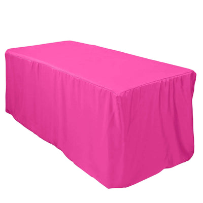 Pink table cover draped over a rectangular table.