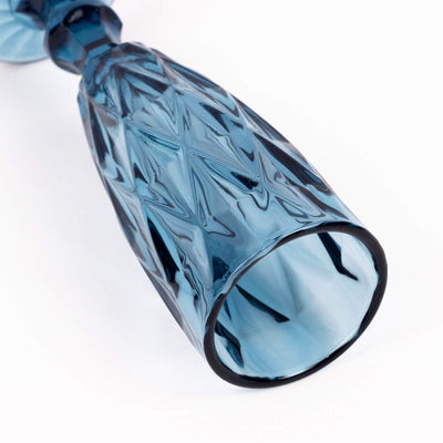 Blue decorative glass vase with intricate diamond pattern