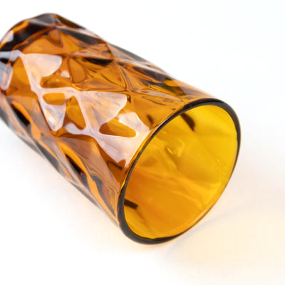 Amber glass tumbler with textured design
