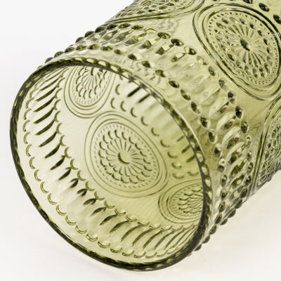 Green textured glass tumbler with intricate design details.